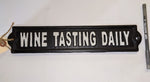 Load image into Gallery viewer, Cast Iron Sign: Wine Tasting Daily
